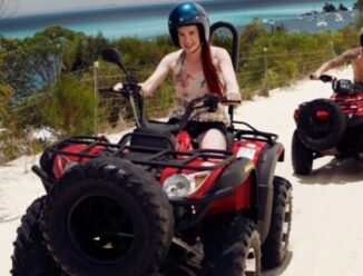 Young Adults Driving Quad Bikes
