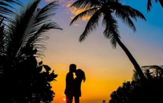 couple enjoying Bahamas sunset